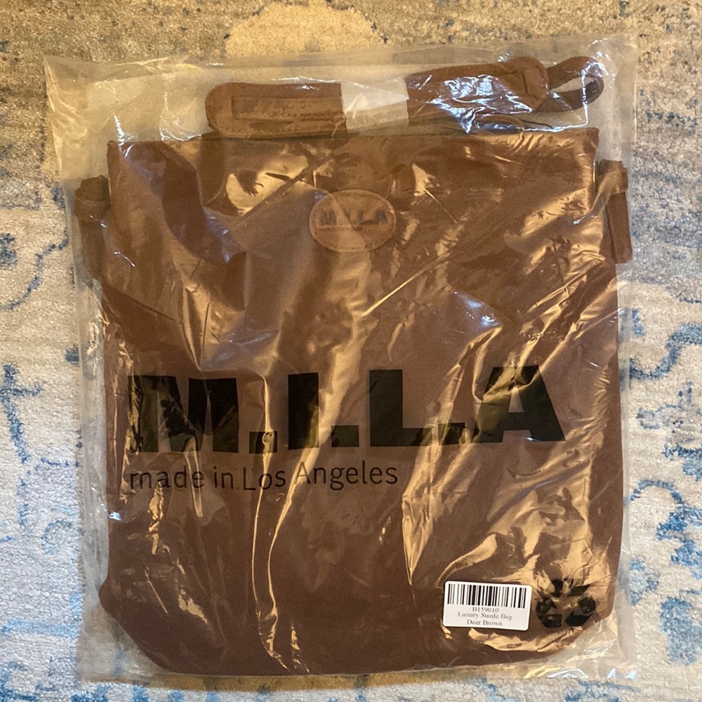 NWT luxury suede shoulder bag.